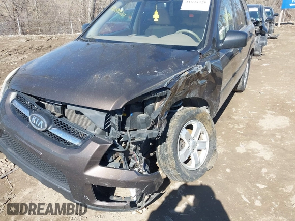 2010 Kia Sportage LX with VIN KNDKGCA32A7697677, listed as a IAAI auction lot 41694920 with 158,212 mi miles and . Bid and sale history available at carsss.com. Image 6.