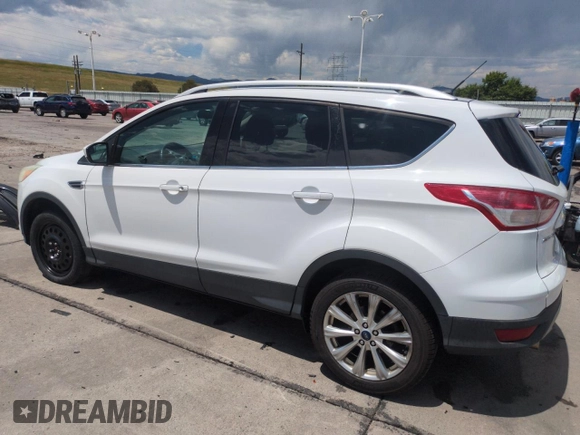 2013 Ford Escape SE with VIN 1FMCU9GX9DUD12210, listed as a Copart auction lot 62496095 with 77,516 mi miles and Salvage title. Bid and sale history available at DreamBid. Image 2.