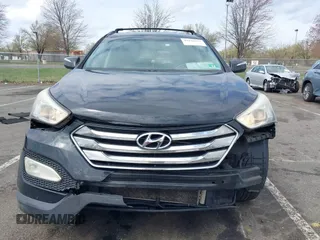 2014 Hyundai Santa Fe z VIN 5XYZUDLBXEG162476, wystawiony jako IAAI lot #41910671 z przebiegiem 146 607 mil mil oraz . Historia ofert i sprzedaży dostępna na DreamBid. Obrazek 6.