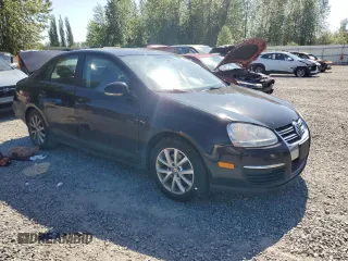 2010 Volkswagen Jetta S with VIN 3VWJZ7AJ1AM032185, listed as a Copart auction lot 58562615 with 189,752 mi miles and Salvage title. Bid and sale history available at DreamBid. Image 4.
