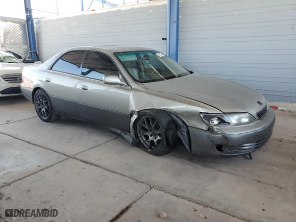 1999 Lexus ES 300 Luxury Sport Sdn with VIN JT8BF28G0X0195269, listed as a Copart auction lot 61767254 with 276,965 mi miles and Salvage Title. Bid and sale history available at carsss.com. Image 4.