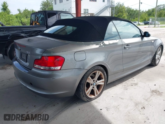 2009 BMW 1 Series 128i with VIN WBAUL73509VJ75662, listed as a IAAI auction lot 42639936 with 96,542 mi miles and . Bid and sale history available at DreamBid. Image 4.