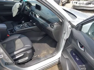 2020 Mazda CX-5 Touring with VIN JM3KFACM9L0785464, listed as a IAAI auction lot 42023311 with 90,062 mi miles and . Bid and sale history available at DreamBid. Image 5.