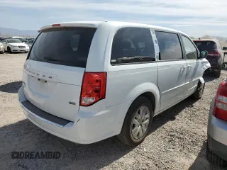 2017 Dodge Grand Caravan SE Plus z VIN 2C4RDGBG1HR864328, wystawiony jako Copart lot #56435325 z przebiegiem 128 795 mil mil oraz Szkoda całkowita • Salvage title. Historia ofert i sprzedaży dostępna na DreamBid. Obrazek 3.