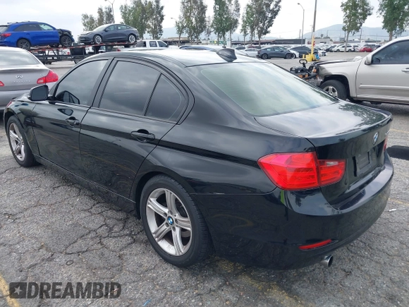 2014 BMW 3 Series 320i with VIN WBA3B1G57ENS80800, listed as a IAAI auction lot 42097683 with 152,924 mi miles. Bid and sale history available at carsss.com. Image 3.