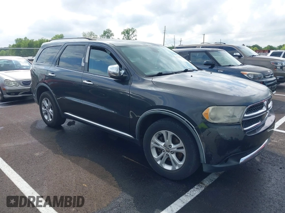 2011 Dodge Durango Crew with VIN 1D4RD4GG6BC651434, listed as a IAAI auction lot 42156389 with 505,373 mi miles and . Bid and sale history available at carsss.com. Image 1.