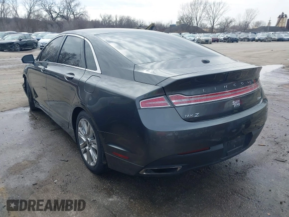 2015 Lincoln MKZ z VIN 3LN6L2JK4FR623686, wystawiony jako IAAI lot #41721095 z przebiegiem 197 922 mil mil oraz . Historia ofert i sprzedaży dostępna na DreamBid. Obrazek 3.