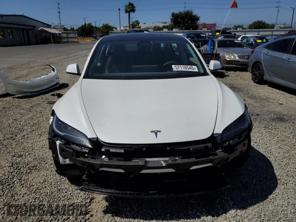 2025 Tesla Model 3 Long Range z VIN 5YJ3E1EA8SF903460, wystawiony jako Copart lot #57116545 z przebiegiem 5 147 mil mil oraz Szkoda całkowita • Salvage title. Historia ofert i sprzedaży dostępna na DreamBid. Obrazek 5.