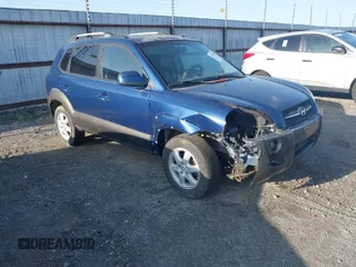 2005 Hyundai Tucson GLS with VIN KM8JN12D95U055893, listed as a IAAI auction lot 41914234 with 184,019 mi miles. Bid and sale history available at carsss.com. Image 1.