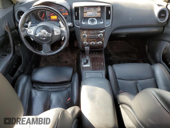 2010 Nissan Maxima SV with VIN 1N4AA5AP7AC871283, listed as a Copart auction lot 66394785 with 295,925 mi miles and Salvage title. Bid and sale history available at DreamBid. Image 8.