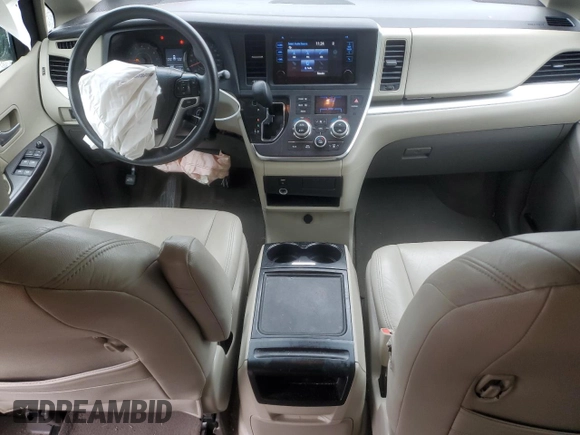 2015 Toyota Sienna LE with VIN 5TDJK3DCXFS126604, listed as a Copart auction lot 56987355 with 102,079 mi miles and Salvage title. Bid and sale history available at DreamBid. Image 8.