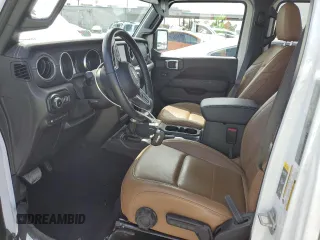 2021 Jeep Wrangler Unlimited Sahara z VIN 1C4JJXP65MW766023, wystawiony jako Copart lot #52332735 z przebiegiem 23 130 mil mil oraz Nie do naprawy • Non repairable. Historia ofert i sprzedaży dostępna na DreamBid. Obrazek 7.