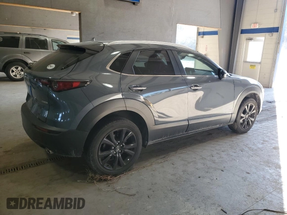 2022 Mazda CX-30 S Carbon Edition с VIN 3MVDMBCL7NM429131, выставлен на аукционе Copart как лот 42421695 с пробегом 21 825 миль миль и Списание • Salvage title. История ставок и продаж доступна на DreamBid. Изображение 3.