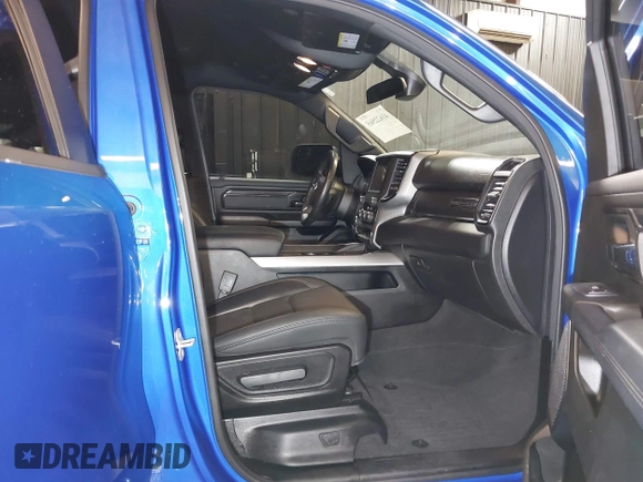 2023 Ram 1500 Big Horn with VIN 1C6SRFFT1PN523907, listed as a IAAI auction lot 41622565 with 24,196 mi miles and . Bid and sale history available at DreamBid. Image 5.
