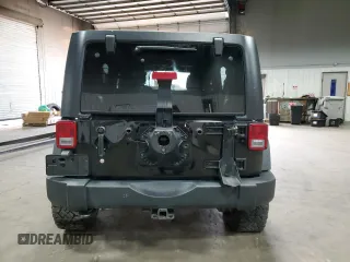 2018 Jeep Wrangler JK Unlimited Sport S with VIN 1C4BJWDGXJL830873, listed as a Copart auction lot 74534084 with 59,805 mi miles and Salvage Title. Bid and sale history available at carsss.com. Image 6.
