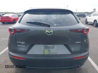 2024 Mazda CX-30 S Carbon Edition with VIN 3MVDMBCM5RM665341, listed as a IAAI auction lot 42180459 with 4,496 mi miles and . Bid and sale history available at DreamBid. Image 16.