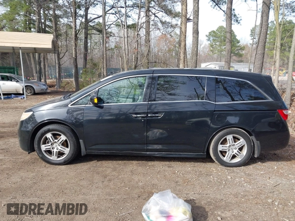 2013 Honda Odyssey Touring with VIN 5FNRL5H96DB003796, listed as a IAAI auction lot 41828376 with 6,308 mi miles and . Bid and sale history available at carsss.com. Image 14.
