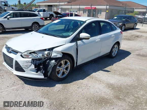 2013 Ford Focus SE with VIN 1FADP3F23DL218239, listed as a IAAI auction lot 42331440 with 156,501 mi miles and . Bid and sale history available at DreamBid. Image 2.