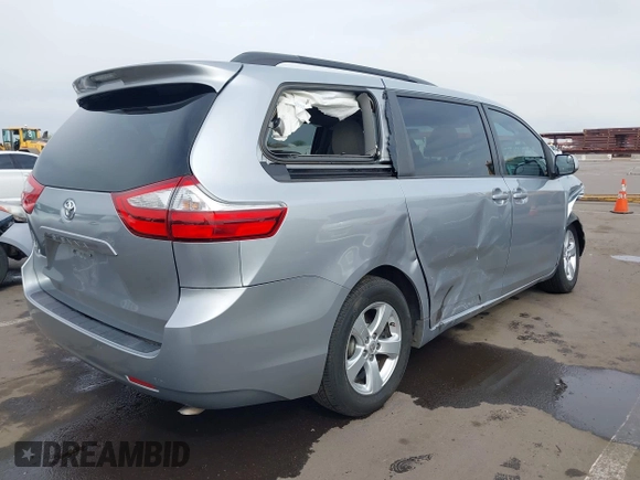 2015 Toyota Sienna LE AAS with VIN 5TDKK3DC6FS627672, listed as a IAAI auction lot 41900555 with 205,111 mi miles. Bid and sale history available at carsss.com. Image 4.