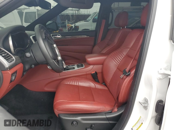 2018 Jeep Grand Cherokee Trackhawk with VIN 1C4RJFN91JC293695, listed as a Copart auction lot 59031525 with 8,565 mi miles and Salvage title. Bid and sale history available at DreamBid. Image 7.