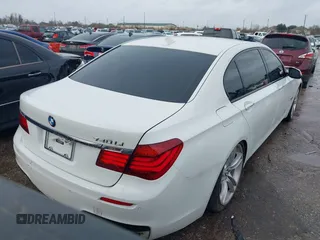 2015 BMW 7 Series 740Li with VIN WBAYE4C54FD947205, listed as a IAAI auction lot 41566291 with 172,729 mi miles and . Bid and sale history available at DreamBid. Image 4.