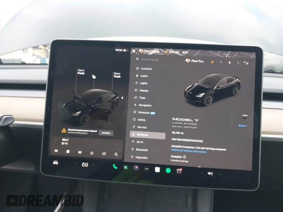 2023 Tesla Model Y Long Range with VIN 7SAYGDEE2PA024032, listed as a IAAI auction lot 41213403 with 23,418 mi miles and . Bid and sale history available at DreamBid. Image 18.