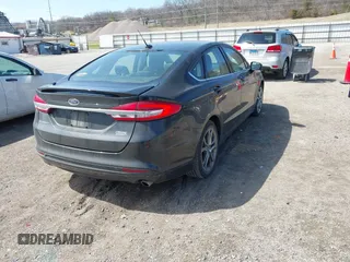 2017 Ford Fusion S with VIN 3FA6P0G71HR347881, listed as a IAAI auction lot 41911834 with 173,508 mi miles. Bid and sale history available at carsss.com. Image 4.