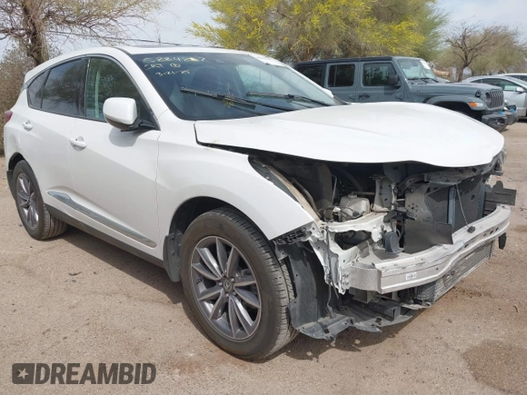 2021 Acura RDX w/Technology Package with VIN 5J8TC1H51ML022573, listed as a IAAI auction lot 41893265 with 56,516 mi miles. Bid and sale history available at carsss.com. Image 6.