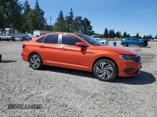 2021 Volkswagen Jetta SEL with VIN 3VWE57BUXMM099832, listed as a Copart auction lot 58607035 with 71,519 mi miles and Salvage title. Bid and sale history available at DreamBid. Image 4.