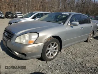 2005 Infiniti Q45 z VIN JNKBF01A15M100072, wystawiony jako Copart lot #48146645 z przebiegiem Nie podano mil oraz Szkody całkowita. Historia ofert i sprzedaży dostępna na DreamBid. Obrazek 1.