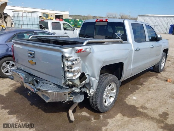 2014 Chevrolet Silverado 1500 LT with VIN 3GCUKREC3EG101975, listed as a IAAI auction lot 41868152 with 221,738 mi miles. Bid and sale history available at carsss.com. Image 4.