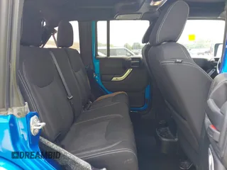 2015 Jeep Wrangler Unlimited Altitude с VIN 1C4HJWEG3FL528051, выставлен на аукционе IAAI как лот 42388844 с пробегом 87 596 миль миль и . История ставок и продаж доступна на DreamBid. Изображение 8.