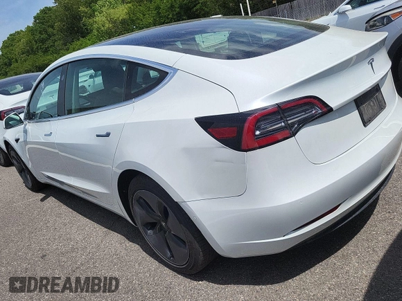 2020 Tesla Model 3 Long Range with VIN 5YJ3E1EB2LF636956, listed as a IAAI auction lot 42184431 with 61,776 mi miles and . Bid and sale history available at DreamBid. Image 1.