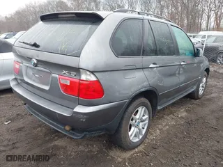 2005 BMW X5 3.0i with VIN 5UXFA13575LY08841, listed as a IAAI auction lot 41831889 with 999,999 mi miles. Bid and sale history available at carsss.com. Image 4.