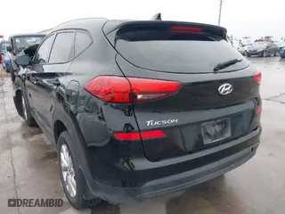 2021 Hyundai Tucson Value with VIN KM8J33A44MU309432, listed as a IAAI auction lot 41653676 with 67,036 mi miles. Bid and sale history available at carsss.com. Image 3.