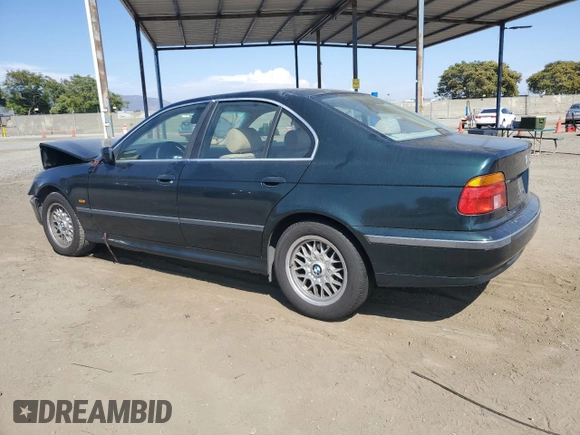 2000 BMW 5 Series 528iA with VIN WBADM6345YGU18707, listed as a Copart auction lot 63293814 with 0 mi miles and Salvage Title. Bid and sale history available at carsss.com. Image 2.