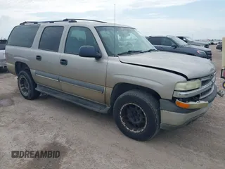 2003 Chevrolet Suburban LS z VIN 3GNEC16Z23G100231, wystawiony jako IAAI lot #42436390 z przebiegiem 163 892 mil mil oraz . Historia ofert i sprzedaży dostępna na DreamBid. Obrazek 1.