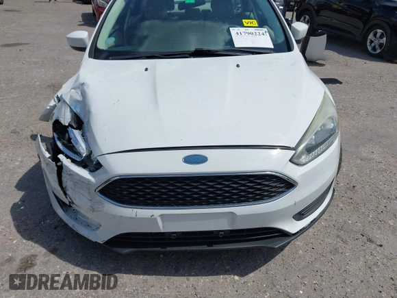 2018 Ford Focus SE with VIN 1FADP3F29JL213008, listed as a IAAI auction lot 41790224 with 85,056 mi miles and . Bid and sale history available at DreamBid. Image 13.