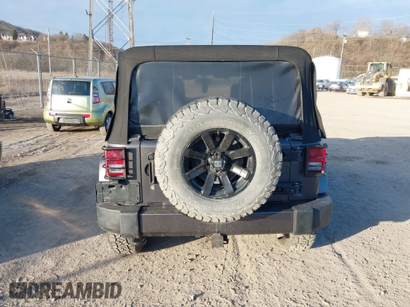 2017 Jeep Wrangler Unlimited Sahara with VIN 1C4BJWEG9HL507908, listed as a IAAI auction lot 41880209 with 99,773 mi miles. Bid and sale history available at carsss.com. Image 16.