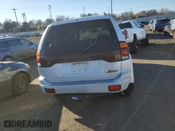 2003 Mitsubishi Montero z VIN JA4MT41RX3J013246, wystawiony jako Copart lot #42210545 z przebiegiem 188 387 mil mil oraz Szkoda całkowita • Salvage title. Historia ofert i sprzedaży dostępna na DreamBid. Obrazek 6.