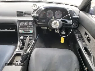 1989 Nissan Skyline z VIN HNR32002973, wystawiony jako Copart lot #73699504 z przebiegiem 72 824 mil mil oraz Szkoda całkowita • Salvage title. Historia ofert i sprzedaży dostępna na DreamBid. Obrazek 8.