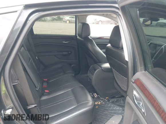 2014 Cadillac SRX Luxury Collection z VIN 3GYFNEE38ES626949, wystawiony jako IAAI lot #42194679 z przebiegiem 173 303 mil mil oraz . Historia ofert i sprzedaży dostępna na DreamBid. Obrazek 8.
