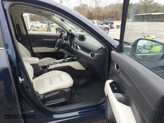 2017 Mazda CX-5 Grand Touring with VIN JM3KFBDL9H0180038, listed as a IAAI auction lot 41394047 with 111,581 mi miles. Bid and sale history available at carsss.com. Image 5.