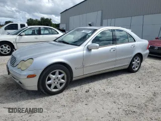 2004 Mercedes-Benz C 320 with VIN WDBRF64J94F458584, listed as a Copart auction lot 71086584 with 112,052 mi miles and Salvage Title. Bid and sale history available at DreamBid. Image 1.