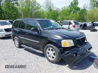 2007 GMC Envoy SLE with VIN 1GKDT13S372103718, listed as a IAAI auction lot 41886111 with 238,423 mi miles. Bid and sale history available at carsss.com. Image 1.