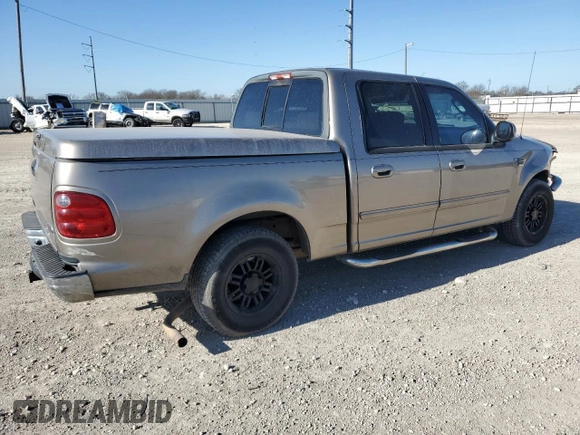 2003 Ford F-150 XLT with VIN 1FTRW07623KB92840, listed as a Copart auction lot 48603105 with 145,516 mi miles and Salvage Title. Bid and sale history available at carsss.com. Image 3.