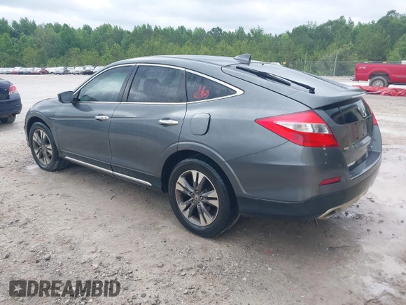 2013 Honda Crosstour EX-L z VIN 5J6TF1H56DL002352, wystawiony jako IAAI lot #42303791 z przebiegiem 178 443 mil mil oraz . Historia ofert i sprzedaży dostępna na DreamBid. Obrazek 3.
