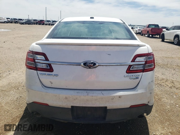 2013 Ford Taurus Limited with VIN 1FAHP2J83DG142778, listed as a Copart auction lot 54799235 with 131,157 mi miles and Clean title. Bid and sale history available at DreamBid. Image 6.