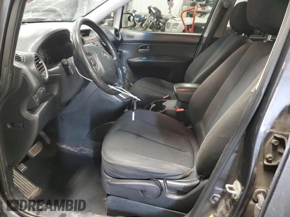2008 Kia Rondo LX Base with VIN KNAFG525287212765, listed as a Copart auction lot 87700005 with 286,337 mi miles and Salvage Title. Bid and sale history available at carsss.com. Image 7.