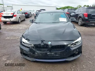 2015 BMW 4 Series 428i xDrive with VIN WBA3N5C56FK198340, listed as a IAAI auction lot 42153190 with 96,054 mi miles and . Bid and sale history available at DreamBid. Image 12.